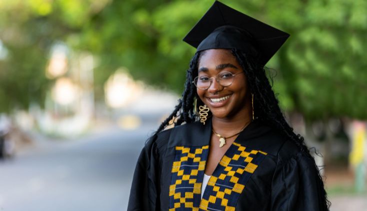 A student in a graduation cap and gown.